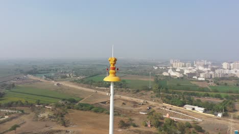 rajkot-atal-lake-drone-view-drone-close-up-shot-showing-lots-of-big-fields-and-big-ashoka-chakra,-Rajkot-New-Race-Course,-Atal-Sarovar