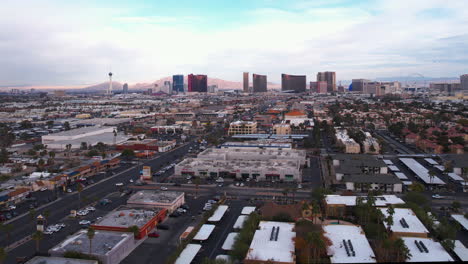 Las-Vegas-Boulevard-Strip-Buildings,-Aerial-View-of-Hotels-and-Casinos-From-West-Neighborhood,-Drone-Shot,-Nevada-USA