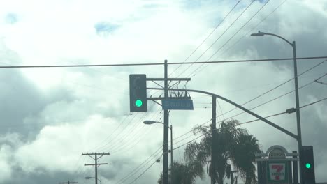 passing-large-traffic-light-on-street