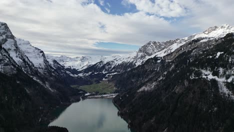 Klöntalersee-Switzerland-fly-slowly-into-famous-lake-and-valley-in-the-Alps