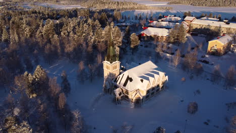Arvidsjaur-Church-Covered-With-Snow-On-Sunny-Winter-Day-In-Arvidsjaur,-Sweden