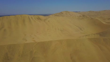 Atacama-Desert-in-Peru-with-Aerial-Drone-Pedestal-Shot-Revealing-Vast-Landscape-in-South-America