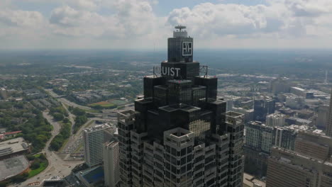 Aerial-cinematic-shot-of-top-of-modern-high-rise-building