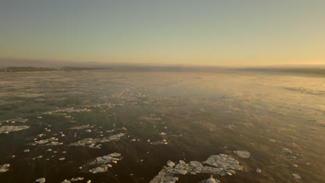 Backwards-aerial-view-over-the-frozen-St