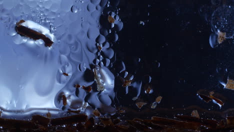 Close-up-of-Ice-cold-oily-liquid-with-cell-like-bubbles-moving-calmly