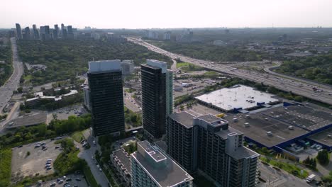 Residential-housing-units-in-high-rise-developments-near-busy-highway-traffic