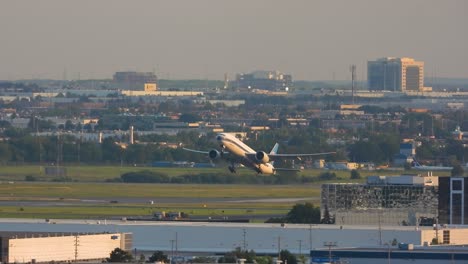 Large-Canadian-passenger-plane-taking-off-from-airport-and-flying-to-its-new-destination-in-Toronto,-Canada