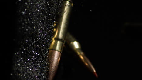 Vertical-View-Of-300-Blackout-Bullets-In-Black-Backdrop