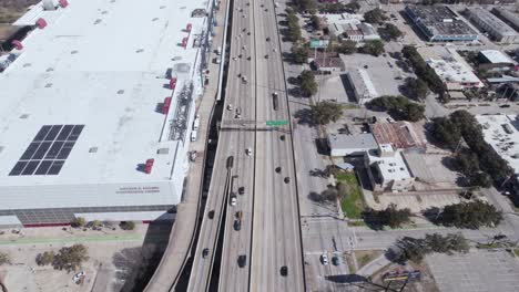 Houston-TX-USA,-Aerial-View-of-US-69-and-I-59-Highway-Traffic,-Eastex-Freeway-in-Downtown-District-by-Convention-Center-and-Minute-Maid-Ballpark-Stadium