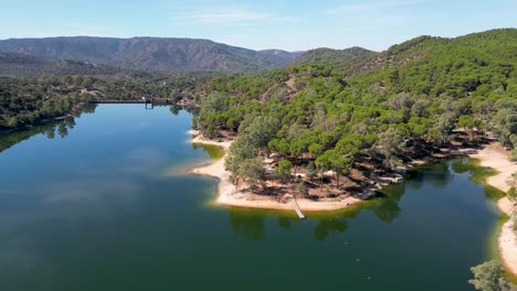 Aerial-view-of-Encinarejo-reservoir-in-mountain-forests-of-Sierra-de-Andujar-nature