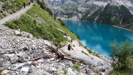 Switzerland,-Brienz,-February-10,-2024:-Tourist-hike-Brienz-Lake-grasslands,-mountains,-valleys-and-meadows-in-Switzerland