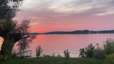 Sunset-on-a-lake-in-Pewaukee,-WI-USA