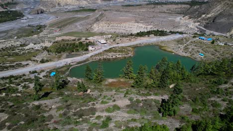 Aerial-Flyover-Towards-Dhumba-Lake-in-Mountain-Valley-Near-Jomsom,-Nepal