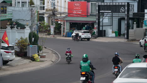 Travelers-on-Motorcycles-in-Urban-Da-Lat-City-Street-Traffic