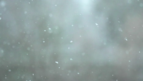 Slowmotion-of-snowflakes-falling-in-the-wind