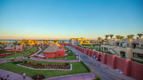 Sunset-Time-Lapse-with-Palm-Trees,-Resorts-Sharm-El-Sheikh-Egypt,-Africa