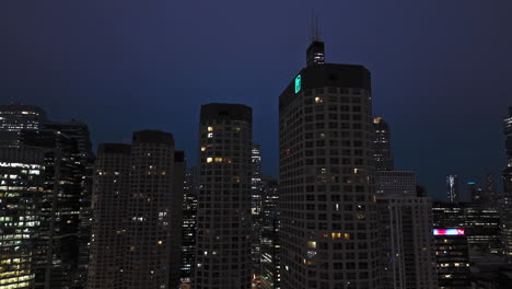 Presidential-apartment-complex-and-the-Willis-tower-in-gloomy-Chicago---Aerial-view