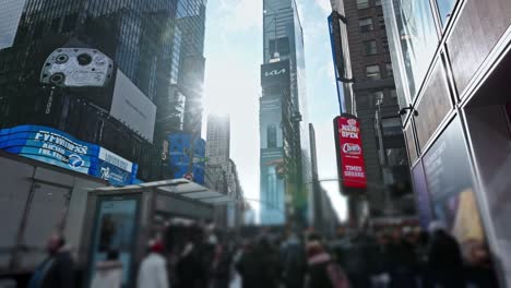 Walking-down-the-bustling-street-at-iconic-Times-Square,-New-York-City