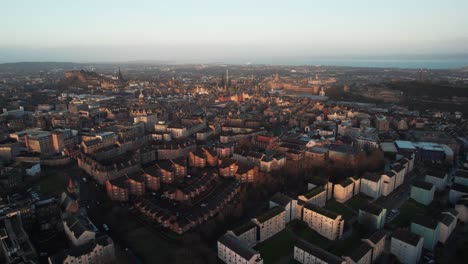 Aerial-view-of-Edinburgh-city-at-sunrise-golden-hour