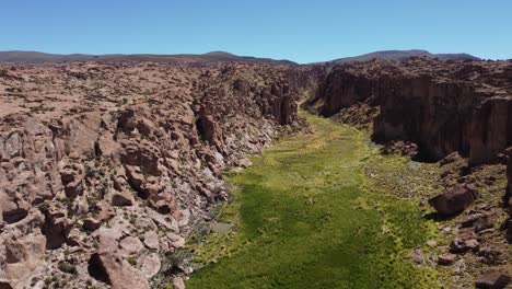 Verdant-green-valley-in-Valle-de-las-Rocas-rocky-landscape-in-Bolivia