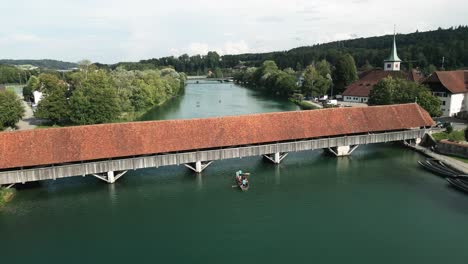 Aerial-of-a-small-medieval-town-next-to-the-river-Aare