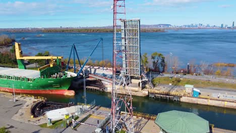 Stunning-cargo-ship-in-port-ready-to-receive-containers-and-travel-around-world-in-Montreal,-Canada