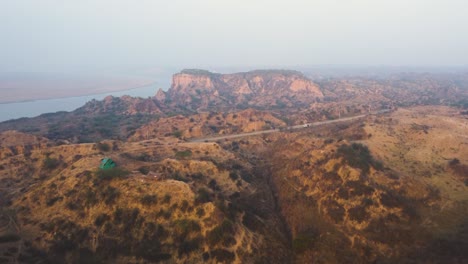 Aerial-drone-shot-of-sand-and-clay-Hills-of-Chambal-River-Valley-with-semi-arid-forest-in-Morena-Dholpur-of-Madhya-Pradesh-Rajasthan-of-India