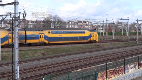 A-train-passes-by-on-a-winters-day-on-a-Dutch-railway