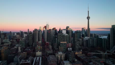 Toronto-skyline-at-sunset,-4K-drone-shot-with-CN-Tower