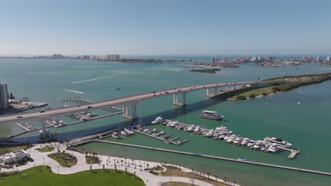 Drone-over-Coachman-Park-following-traffic-on-Clearwater-beach-bridge