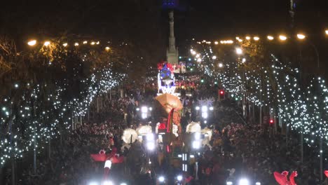 Parade-floats-greet-children-and-families-at-the-Three-Wise-Men-festival,-also-known-as-the-Three-Kings-Parade