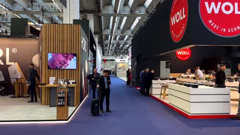 Pov-walk-on-blue-carpet-at-trade-fair-hall-in-Frankfurt