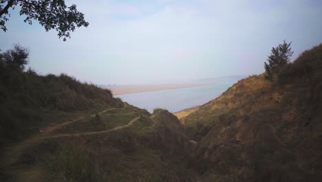 Wide-Pan-shot-of-Chambal-river-valley-landscape-in-Morena-Dholpur-of-Madhya-Pradesh-Rajasthan-in-India