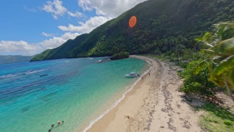 Tropical-sand-beach-paradise-in-the-Caribbean,-dynamic-FPV-establisher