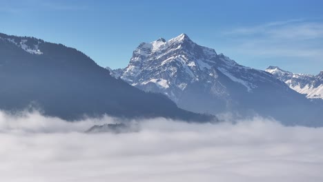 Alpine-Majesty:-Swiss-Peak-in-Cloud-Sea