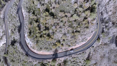 Switchback-road-with-cars-driving-on-Highway-89-A-in-Sedona,-Arizona-with-drone-video-overhead-moving-forward