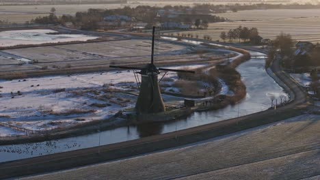 An-old-windmill-in-the-countryside-of-Netherlands-during-winter