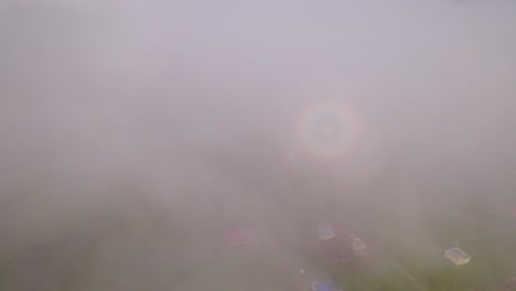 Aerial-Drone-Shot-Of-Magnificent-Clouds-View-Over-Oxapampa-Town,-Peru