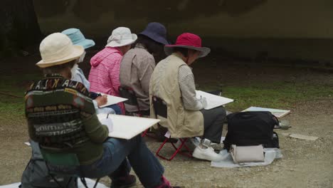 Japanese-Women-Sitting-Down-drawing-as-a-recreational-activity-In-Nara