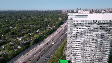 Condominium-tower-residential-housing-developments-near-busy-Highway-401-traffic