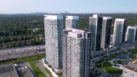 North-York-condominium-developments-near-Highway-401-with-CN-Tower-and-downtown-skyline-in-background
