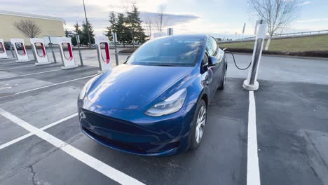 Tesla-Model-Y-topping-off-the-tank-at-a-Supercharger