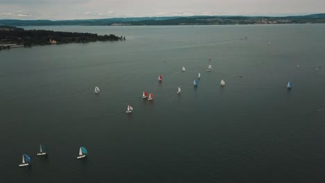 Wind-fills-the-sails-of-sloops-racing-in-an-annual-regatta-in-Germany