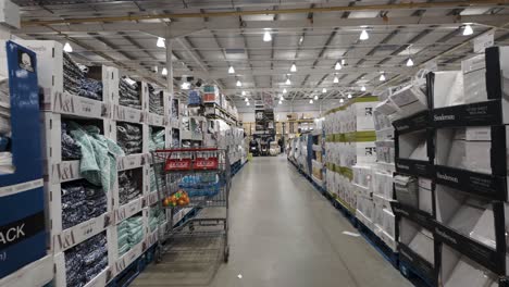 POV-Walking-Along-Towel-And-Bed-Linen-Aisle-At-Costco-Warehouse