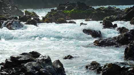 Ocean-waves-crash-against-the-rocks-in-slow-motion