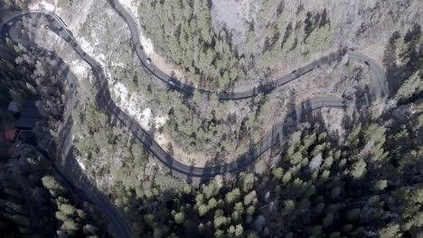 Switchback-road-with-cars-driving-on-Highway-89-A-in-Sedona,-Arizona-with-drone-video-overhead-stable