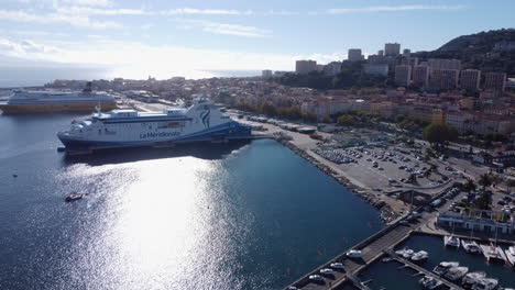 Panoramic-view-of-Ajaccio,-cruise-ships-docked-in-port,-Corsica