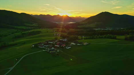 Golden-Horizon-Over-Downhill-Village-During-Sunset