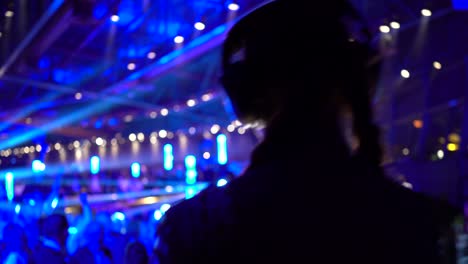 Indoor-view-of-Dj-party-in-club-with-blurred-background