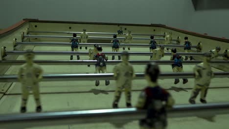 Close-up-of-a-table-soccer-game-with-Real-Madrid-vs